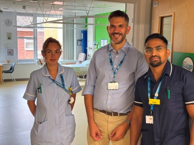 Adam Carson, Managing Director, pictured centre celebrating results with ward staff
